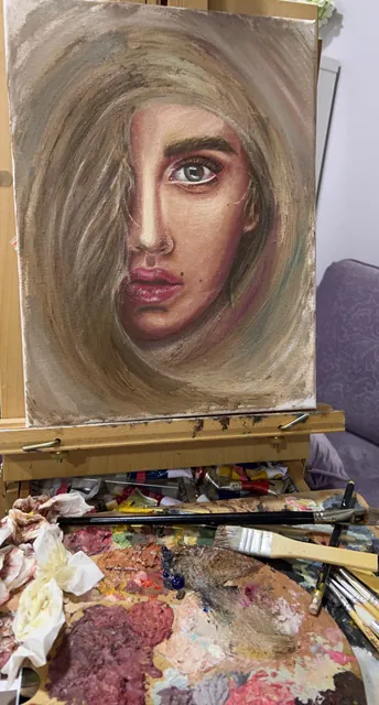 لوحة بورتريه على حامل الرسم